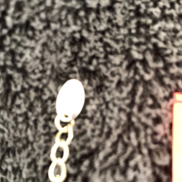 Heart bling dime size w/solid back with slight rub marks on back. Silver color. - Picture 9 of 15